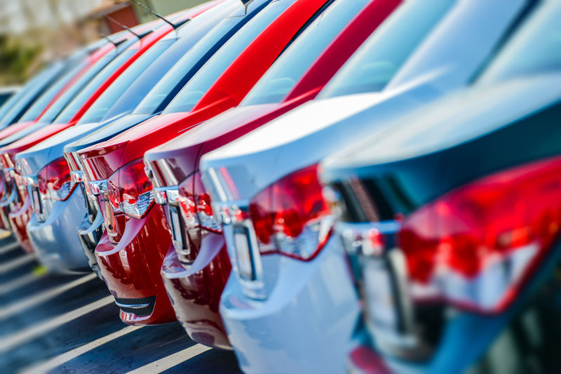 Fleet of cars lined up outside to be hired as personal and business vehicles